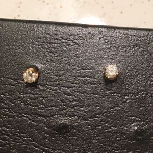 Pair of 14k Pierced Diamond Studs, .25 ct weight.